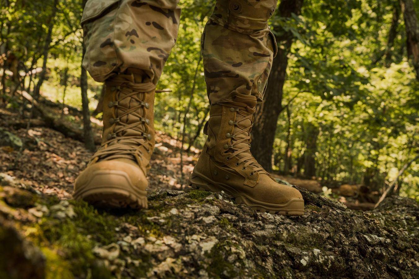 Soldier walking through forest in combat boots