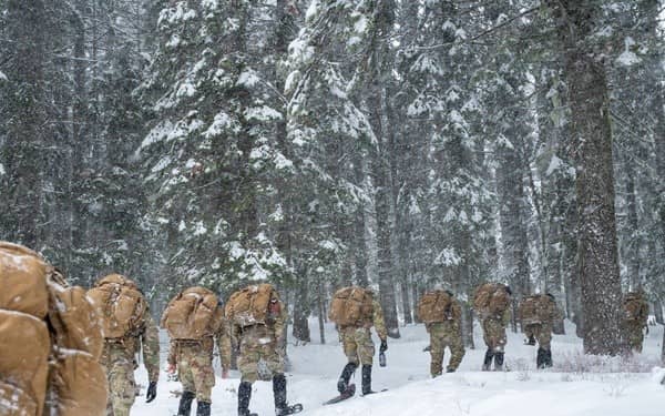 Soldiers marching in line in the snow